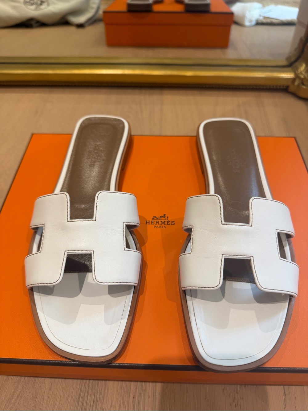Hermes Oran Slide Sandals - Box calfskin in Blanc
